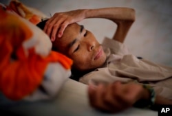Vietnam'da AIDS hastalığının ileri düzeyde etkileriyle rahatsızlanan Pham Huu Kho isimli hasta.